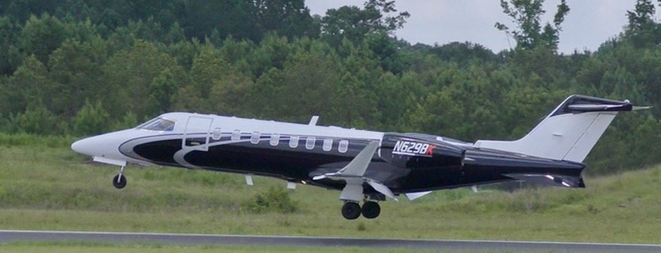 Brad Keselowski's Learjet N629BK departing the runway
